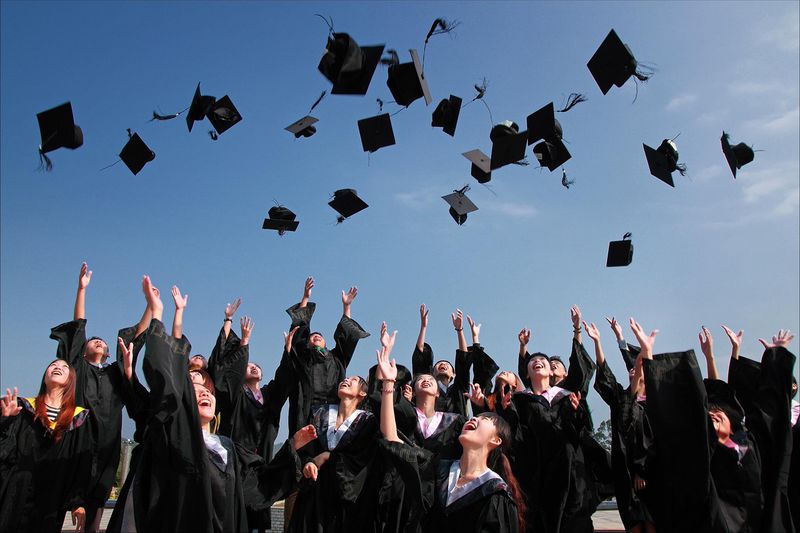 File:Graduates throwing hats.jpeg