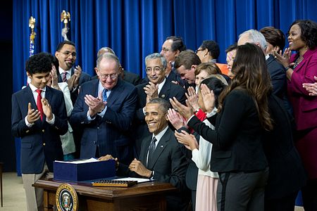 President Barack Obama signs Every Student Succeeds Act (ESSA).jpg