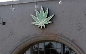 Sign advertising a marijuana dispensary.jpg
