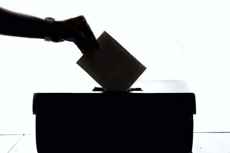 File:HandPlacingBallotinBox.jpg