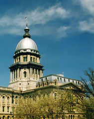 Illinois governor signs six-month stopgap budget