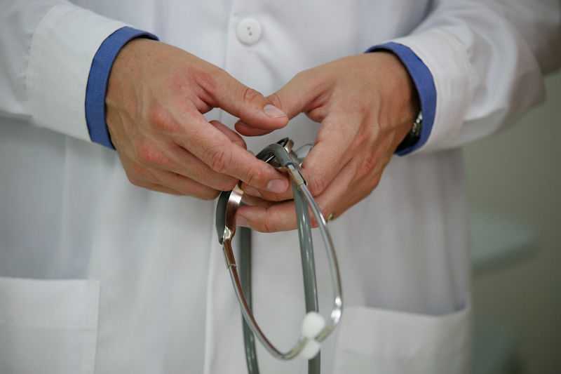 File:Doctor with stethoscope.jpg